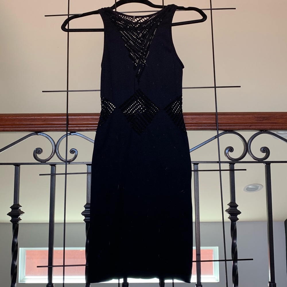 Sexy form fitting little black dress mesh detail